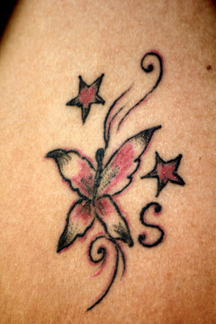 Butterfly and Star with Letter S Tattoo Design