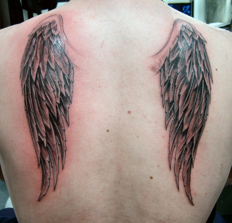 Beautiful Wing Tattoo on Back for Women