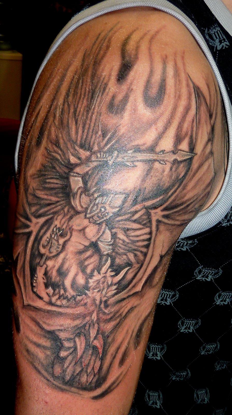 Angels And Demon Tattoo In Fire Pictures