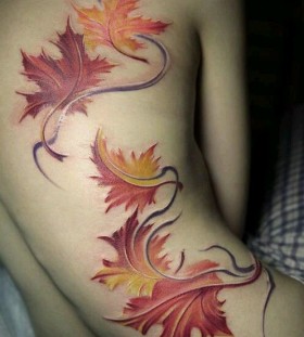 autumn-leaves-in-wind-tattoo-on-back autumn-leaves-in-wind-tattoo-on-back