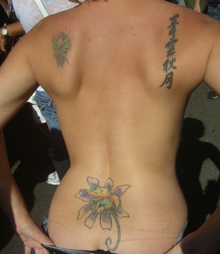 Unique Tattoo Design on Back for Girls