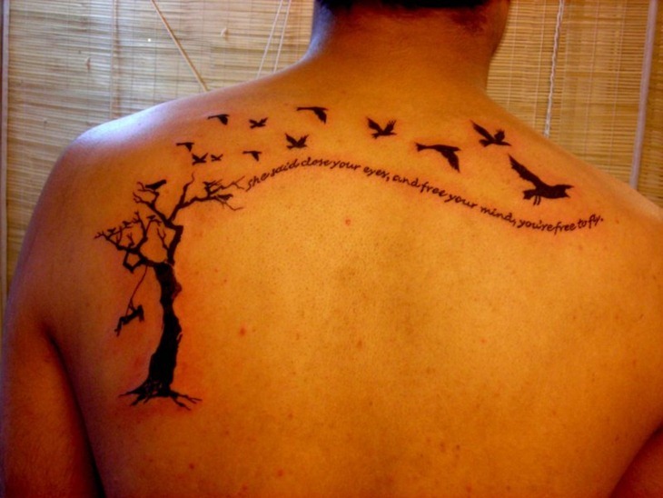 Cool Upper Back Tattoo Design For Men