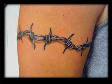 Stunning Upper Arm Circular Barbed Wire Tattoo Design