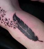 Bold Feather Bird Tattoo Design Ideas