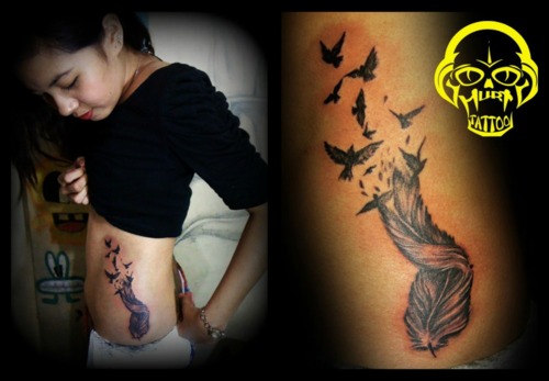 Feather Tattoo Design on Ribs for Women