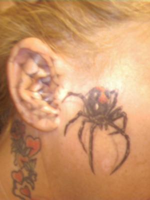 Black Widow Spider Tattoo On Face For Girls