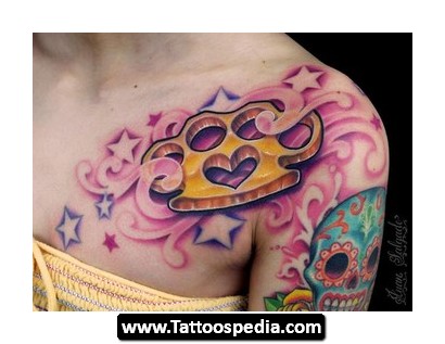 Brass Knuckle Tattoo on Shoulder