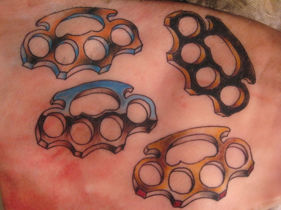 Piggys Brass Knuckles – Tattoo Ink Design