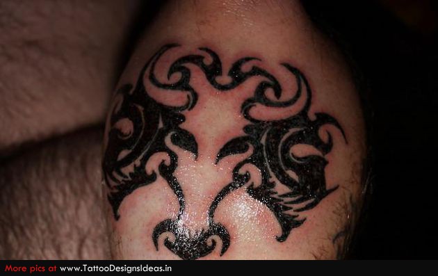 Tribal Bulls Head Tattoo On Feet