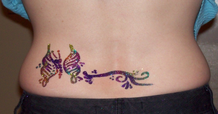 Sparkling Colorful Lower Back Butterfly Tattoo For Women