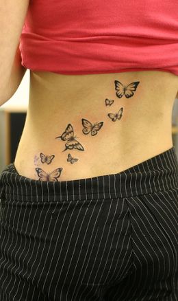 Flying Butterfly Tattoo Design For women