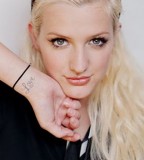 Ashlee Simpson's Celebrity with Wrist Hand Tattoos