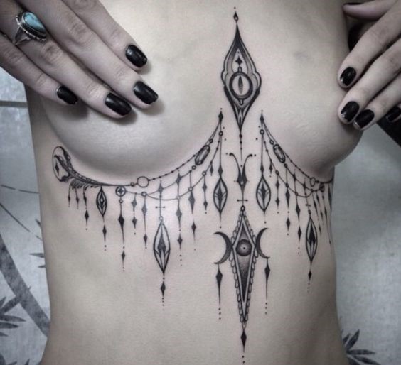 chandelier-style-sternum-tattoo-by-philip-milic