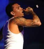 On-Stage Chris Brown Photo Showing Sleeve / Shoulder Tattoos - Celebrity Tattoos