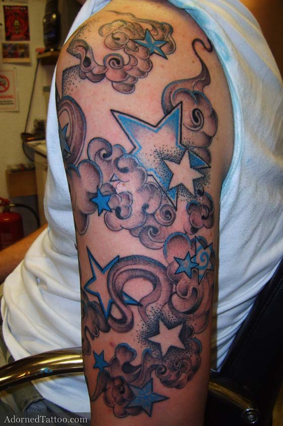 Stars And Clouds Tattoo on Upper Arm for Men