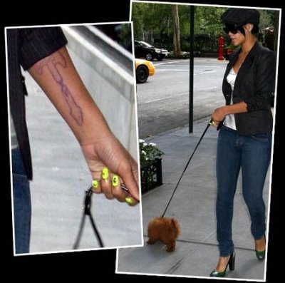 Cool Guitar Tattoos On the Left Hand Rihanna’s