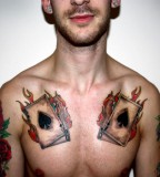 Firing Cards Chest Tattoo Inspiration for Guys