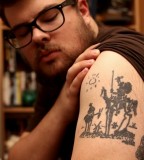 Cool Black Upper Arm Tattoo Design For Men