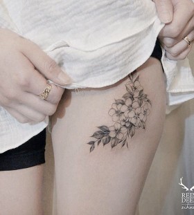 delicate-upper-thigh-flower-tattoo
