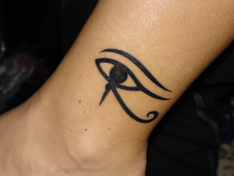 Cute Huros Eye Shape Tattoo Design on Foot