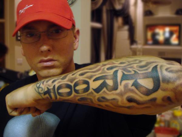 Eminem “Proof” Flaming Lower Arm Tattoo