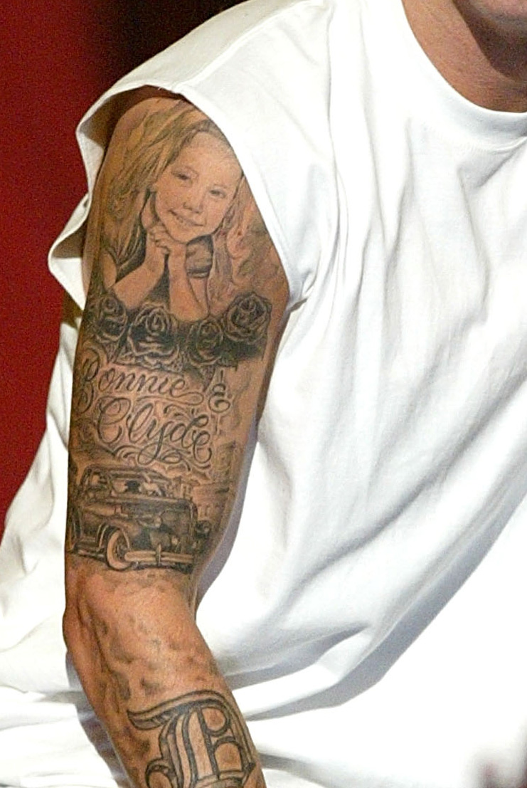 Eminem’s Upper Sleeve Tattoo: The Daughter and Bonnie and Clyde Inspired Tattoo