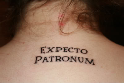 Awesome Lettering Harry Potter Spell Expecto Patronum Tattoo on Women Upper Back