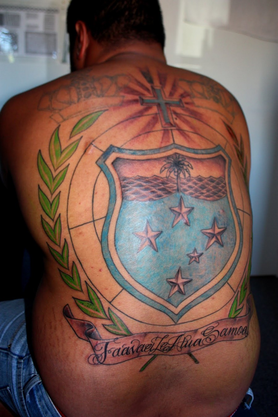 Awesome Full Back Cross and Logo Tattoo Design for Men