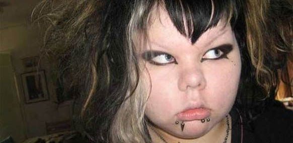 Funny Fat Emo Girl with Chic Tattoos at Face