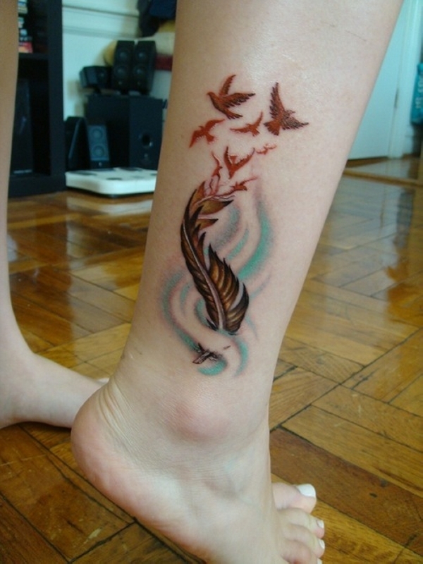 Artistic Feather Tattoos On The Leg