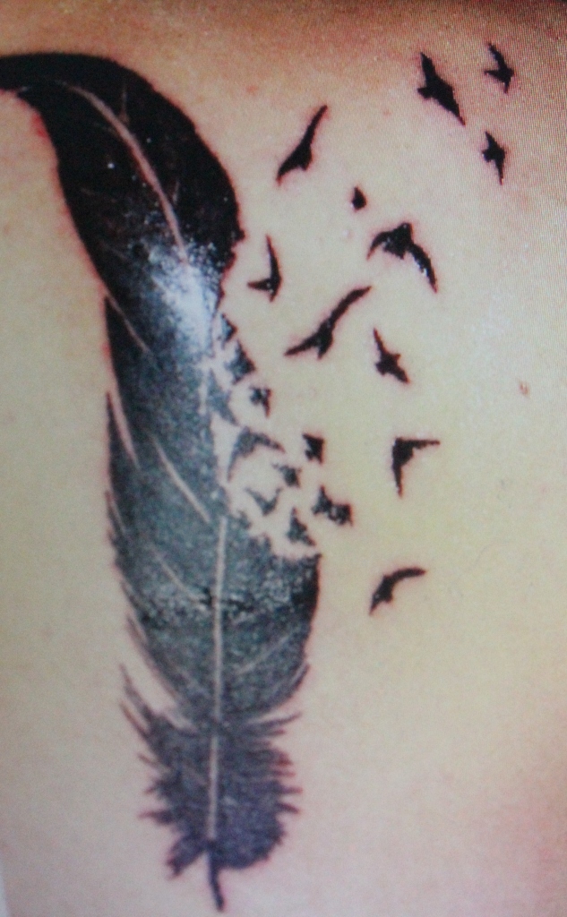 Charming Image Of Bird Feather Tattoo