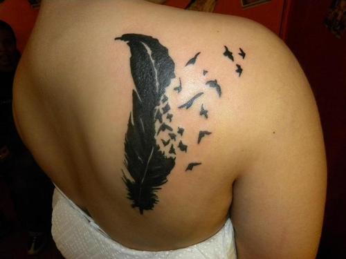 Amazing Feather Bird Tattoo On The Upper Back