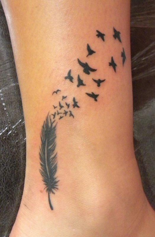 Black Feather into Birds Leg Tattoo