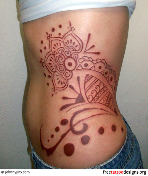 Feminine Traditional Polynesian Hip & Rib-cage Tattoo Design for Women