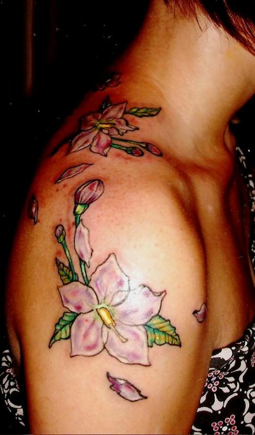 Feminine Upper-arm to Over-shoulder Flowers Tattoo Design for Women