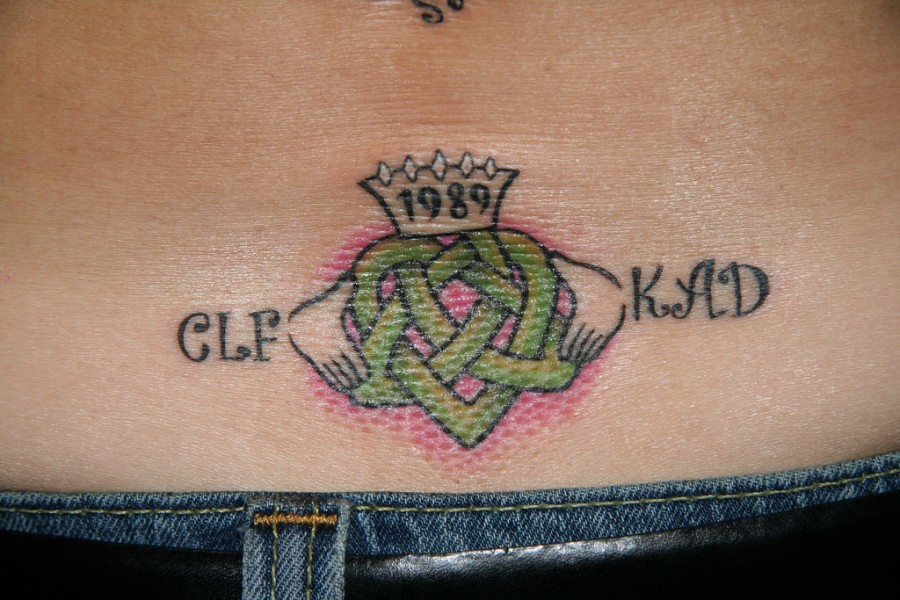 Unique Love Four Leaf Clover Tattoo On Back With Nicknames