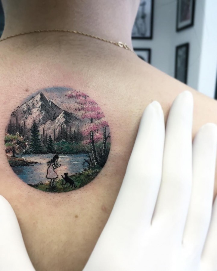 girl-playing-with-dog-scenery-circle-tattoo