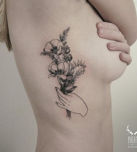 gorgeous-ribcage-flower-tattoo