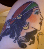 Gypsy Chubby Women Head Tattoo on Outer Calf