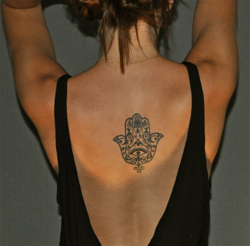 Striking Hamsa Back Tattoo for Women