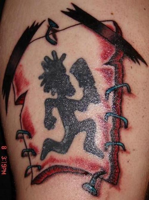 On Arm Hatchet Man Tattoo