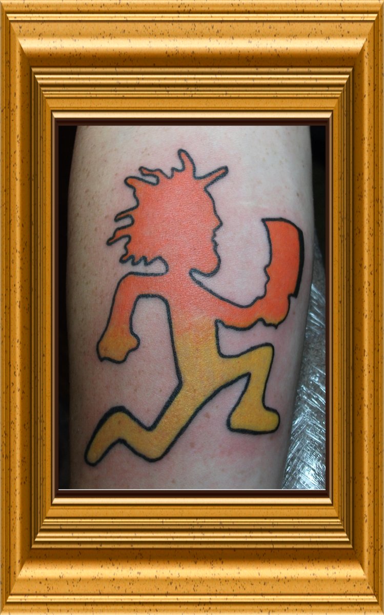 Running Hatchetman Tattoo Design On The Leg