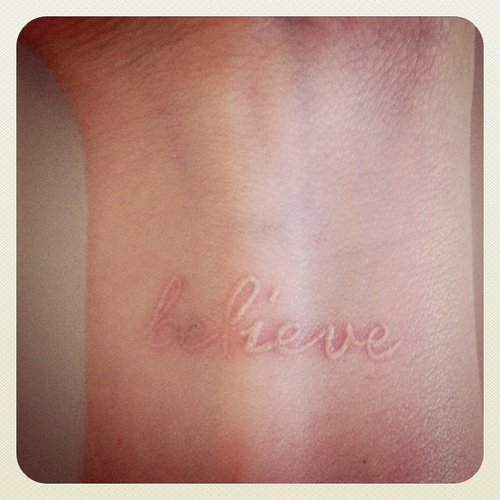 Believe Word White Ink Tattoo