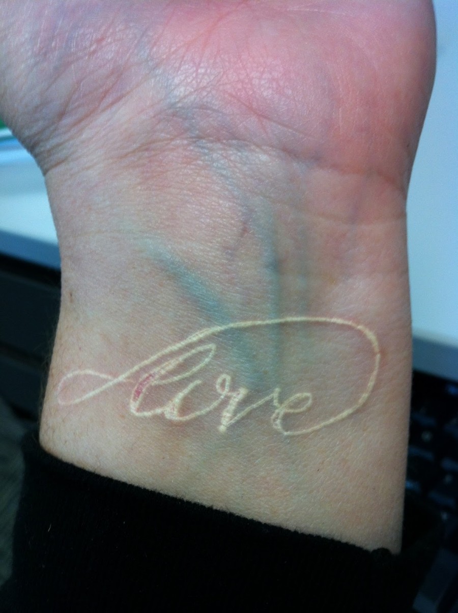 Love Word White Ink Tattoo