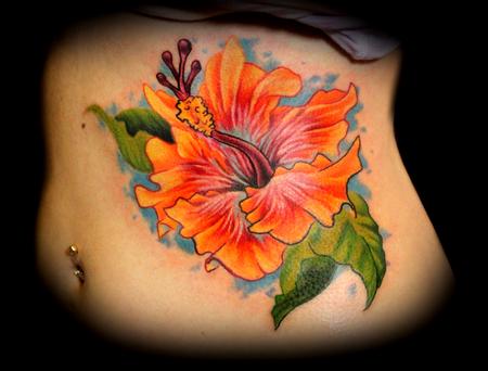 Hibiscus Flower On Ribs Tattoo Ideas