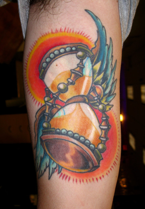 Awesome Hourglass Tattoo Design on Forearm