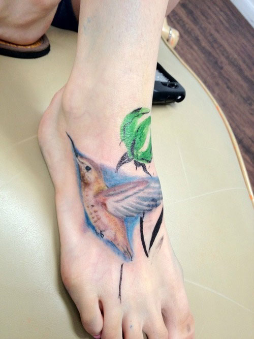 Peaceful Hummingbird Tattoos Design on Foot