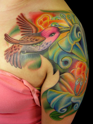 Gorgeous Tribal Style Design Of Colored Hummingbird And Flowers