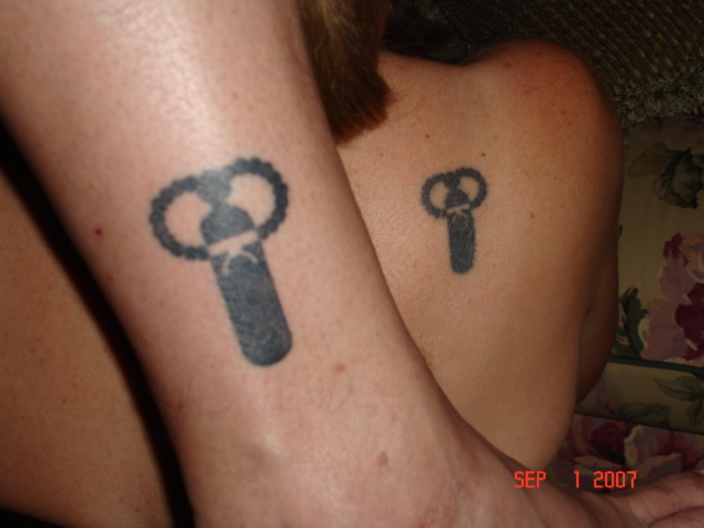 Love Key Matching Tattoos For Couples On Forearm