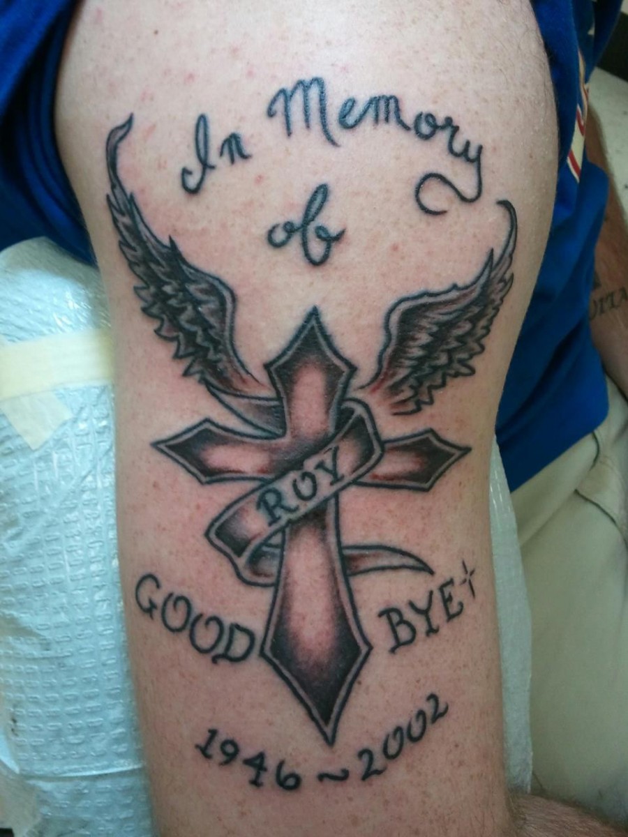 Cross And Wings In Loving Memory Tattoo Design on Arm